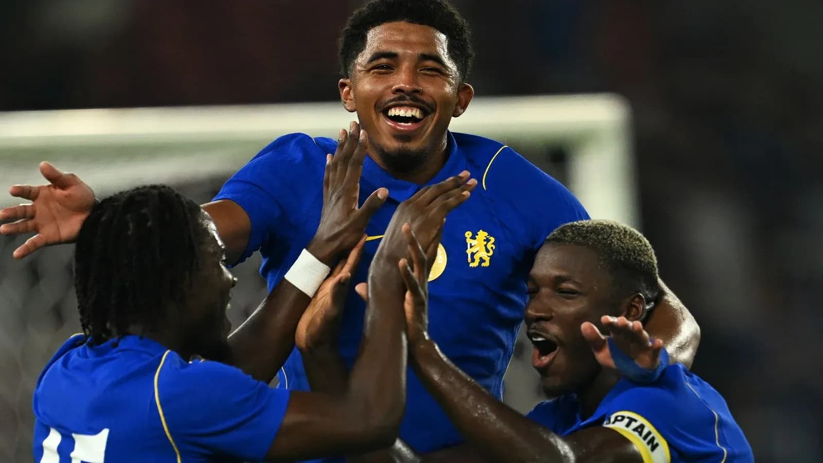 Players celebrating after scoring a goal for Chelsea