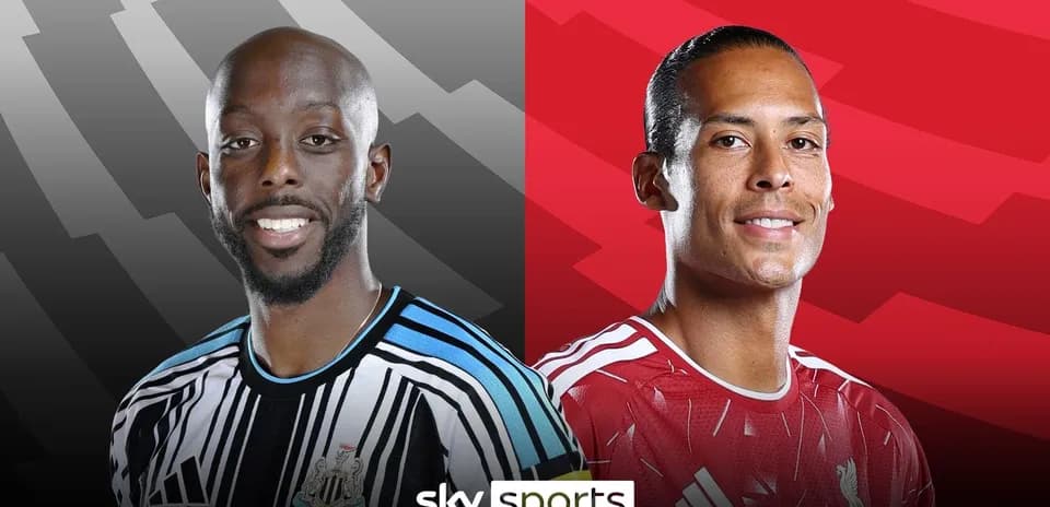 Newcastle and Liverpool players facing each other