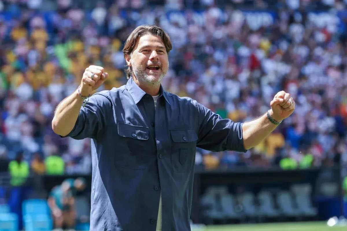 Coach celebrating during a match at the stadium