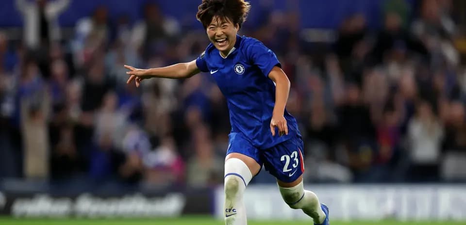 Chelsea player celebrating a goal on the field