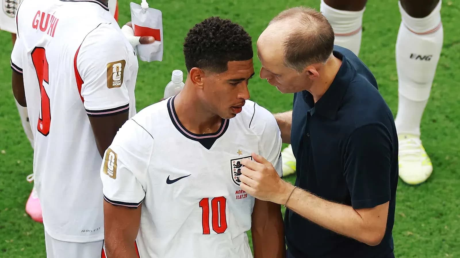 Player receiving guidance from coach during match