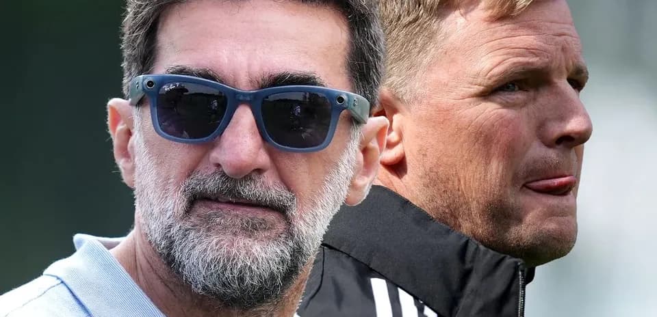 Two coaches observing training session in sunglasses