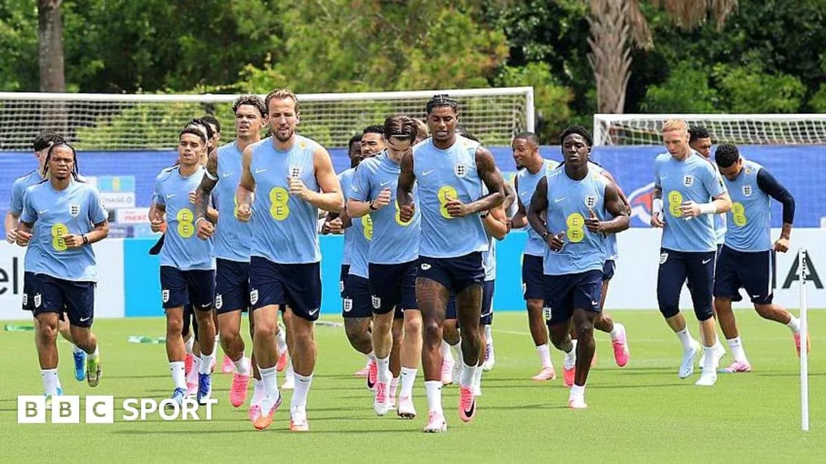 England players running during training session