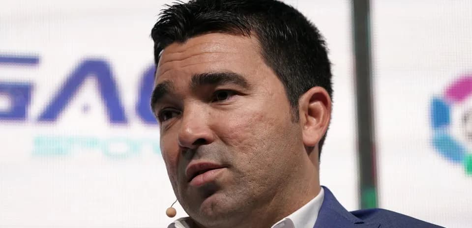 Person speaking at event with microphone attached