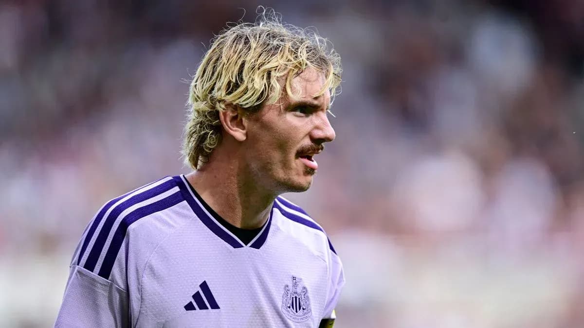 Player wearing Newcastle jersey during match action