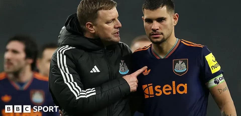 Coach discussing strategy with player after match