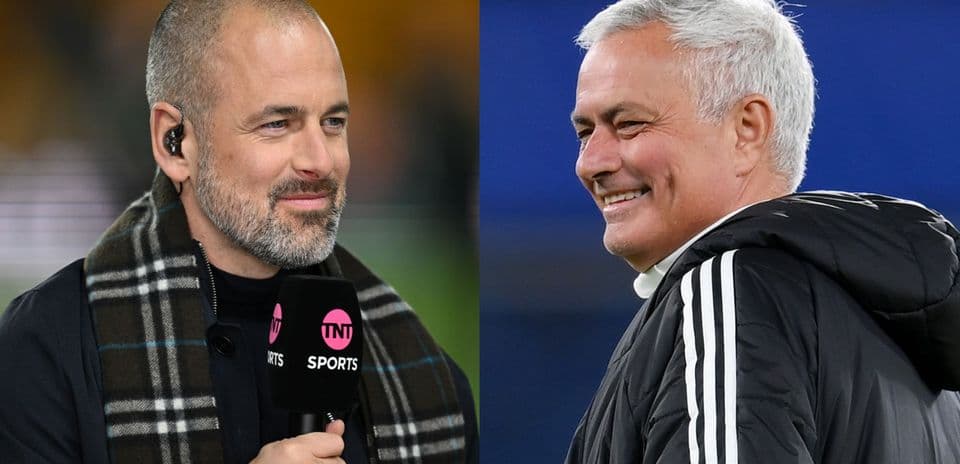Two sports commentators, one smiling, one speaking