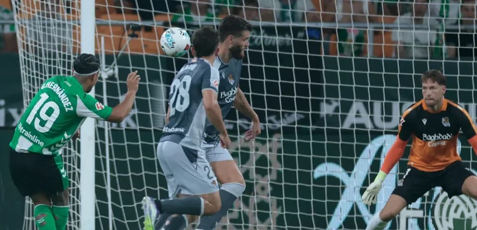 Real Betis player attempts to score against Real Sociedad