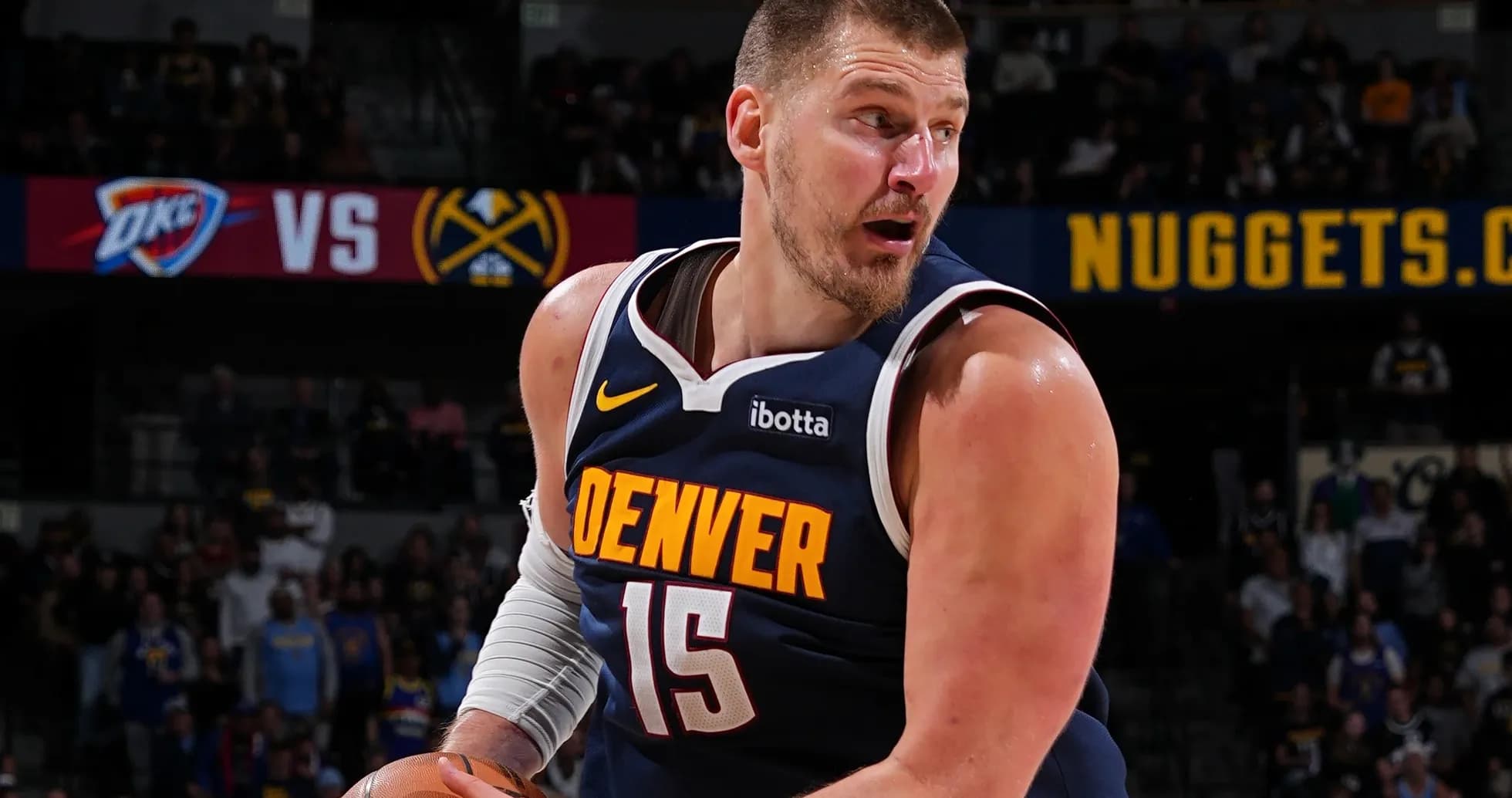 Player dribbling the ball during NBA game