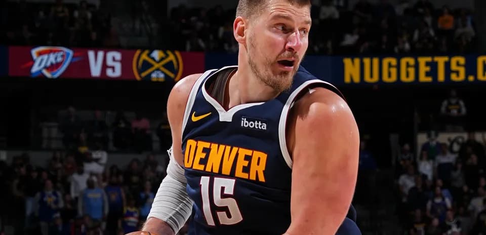 Player dribbling the ball during NBA game