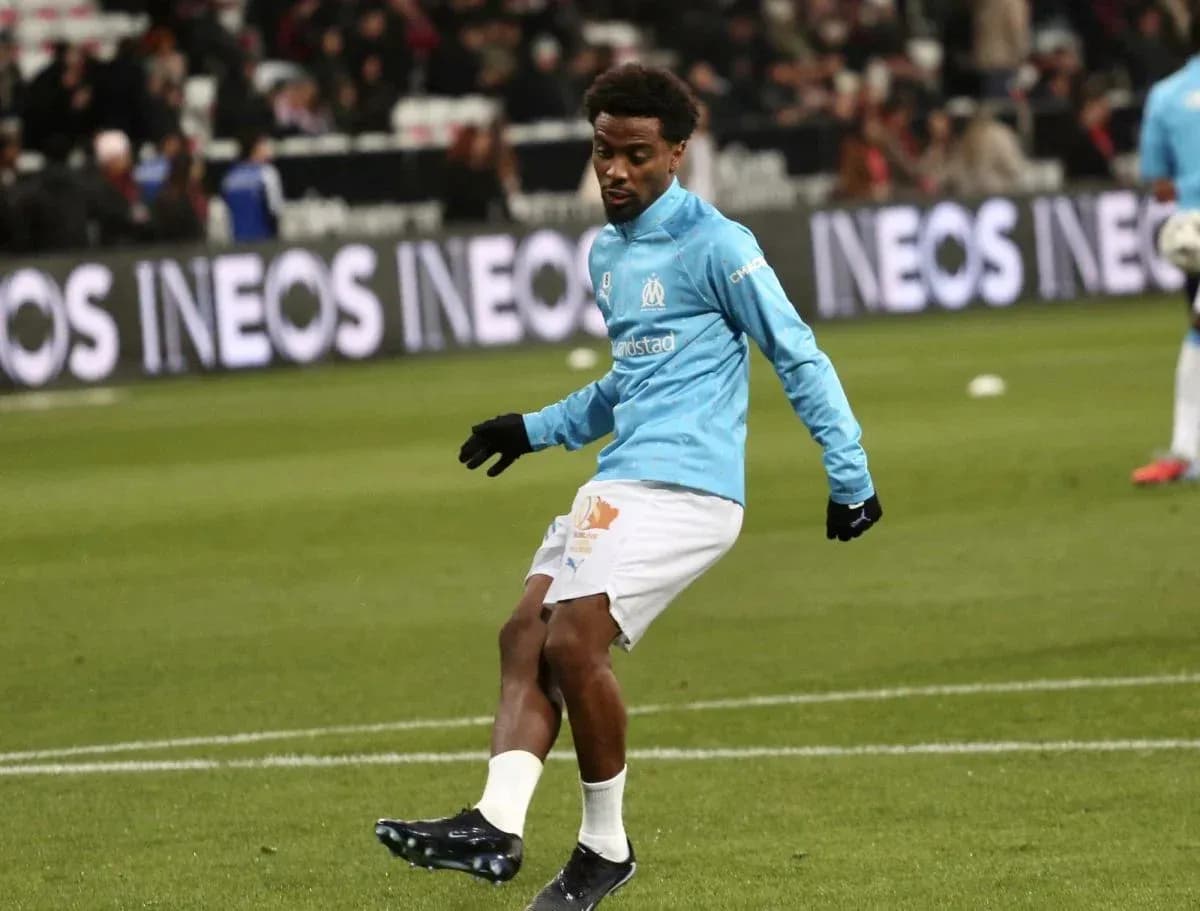 Player warming up on field before match