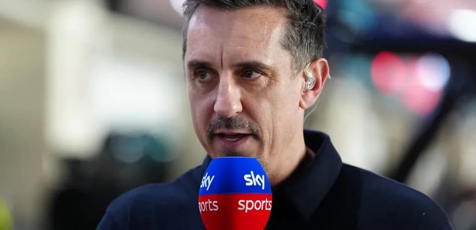 Sportscaster speaking into microphone during broadcast