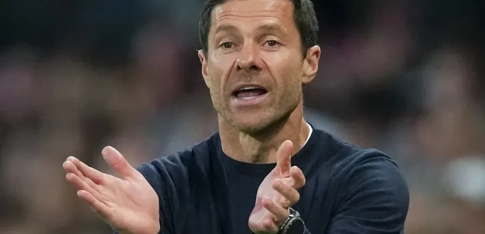 Coach gesturing during a match from the sideline