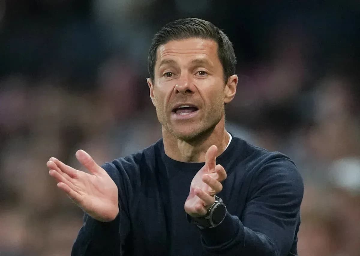 Coach gesturing during a match from the sideline
