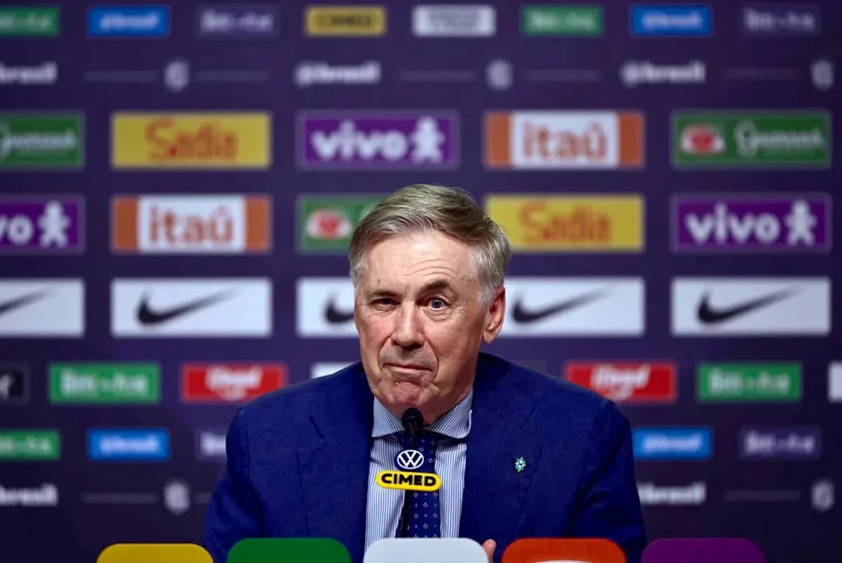 Manager at press conference with sponsor backdrop