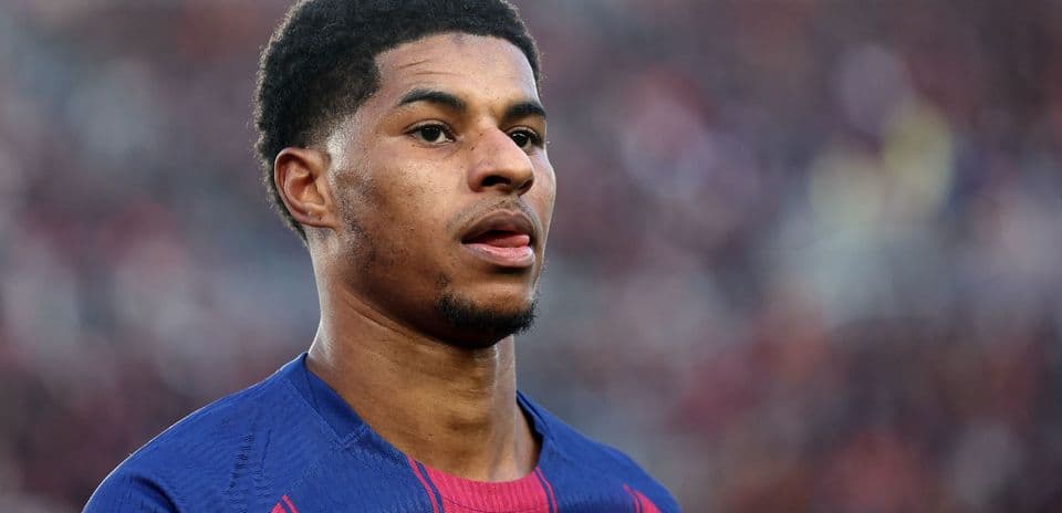 Player in Barcelona jersey during match warm-up