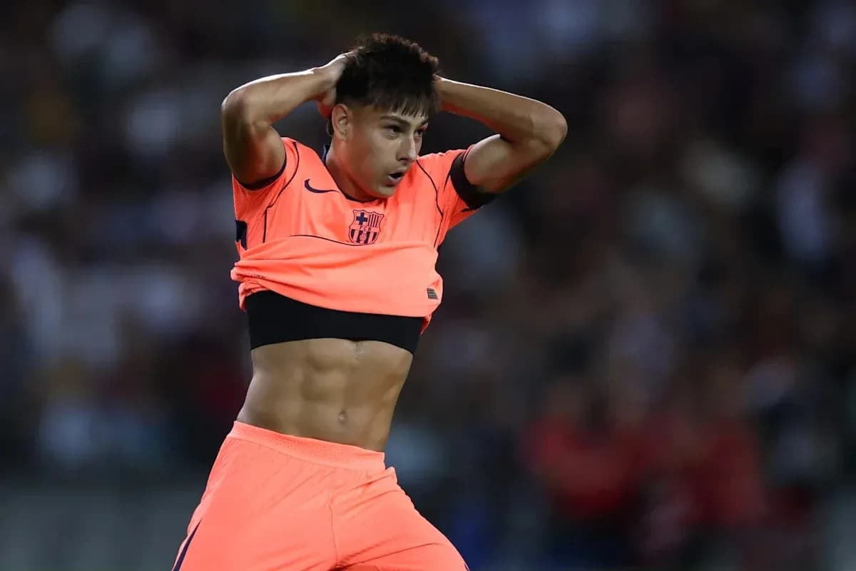 Player adjusting jersey during match on field