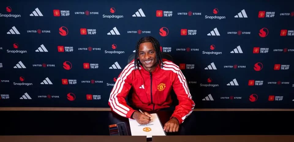 Player signing contract at Manchester United announcement