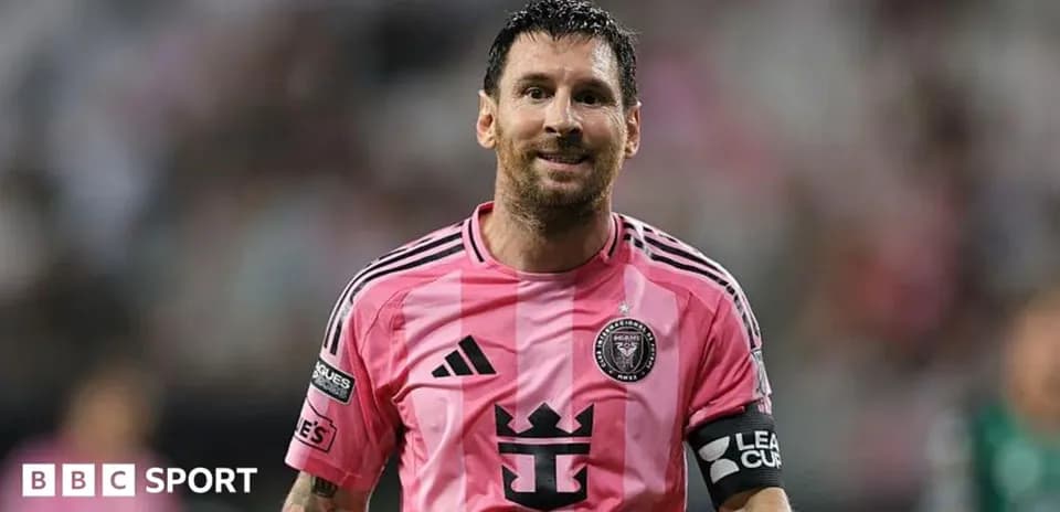 Player in pink jersey celebrating on the field