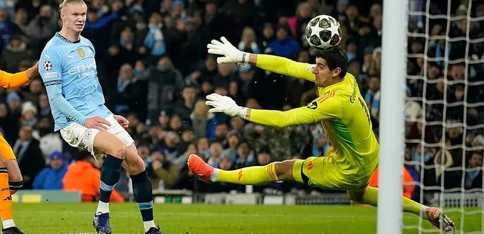 Erling Haaland shooting on goal against Real Madrid