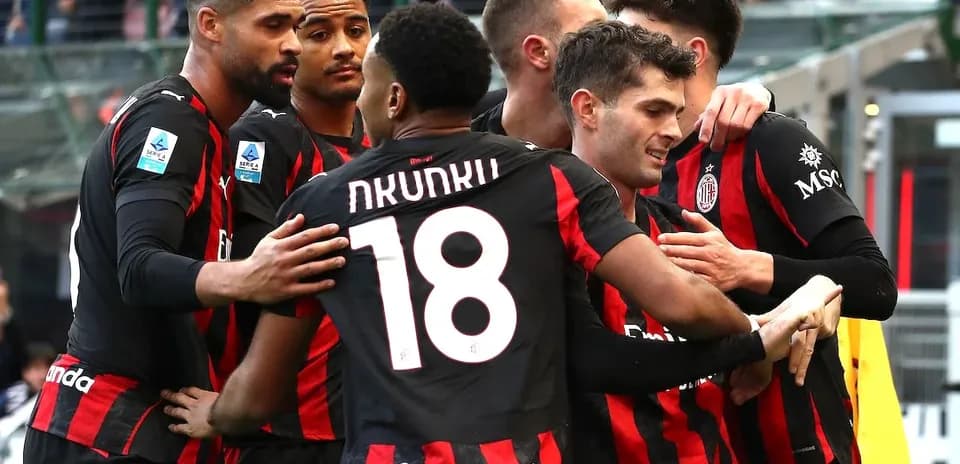 AC Milan players celebrating a goal