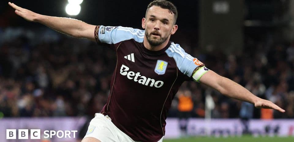 Aston Villa player celebrating a goal on pitch