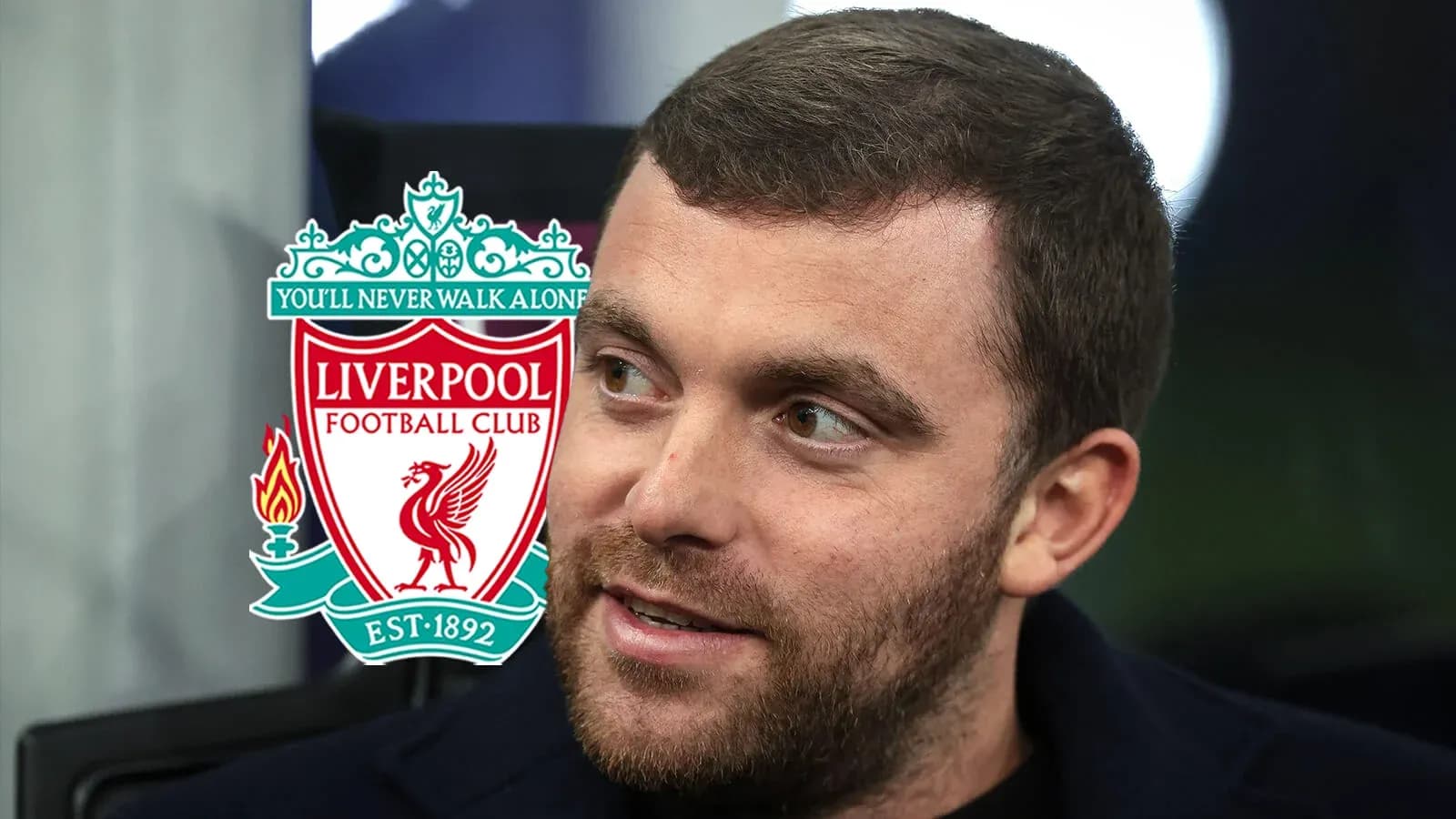 Person with Liverpool FC logo in background