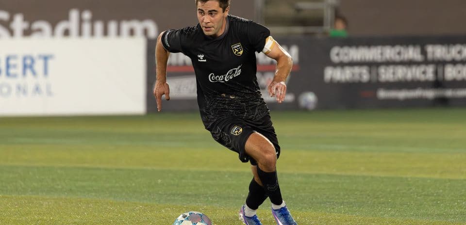 Player dribbling the ball during match