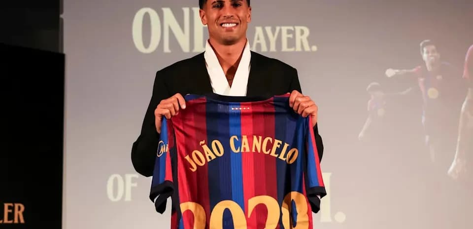 João Cancelo presenting Barcelona jersey at announcement