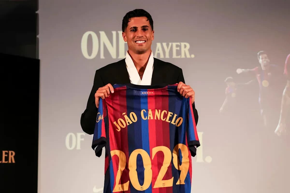 João Cancelo presenting Barcelona jersey at announcement