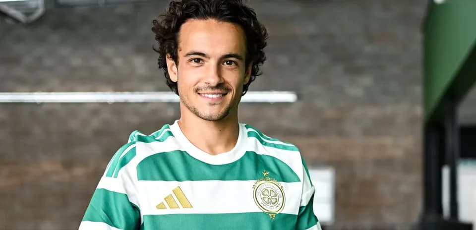 Player posing in green and white striped jersey