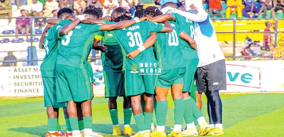 Nasarawa United players in a huddle before match