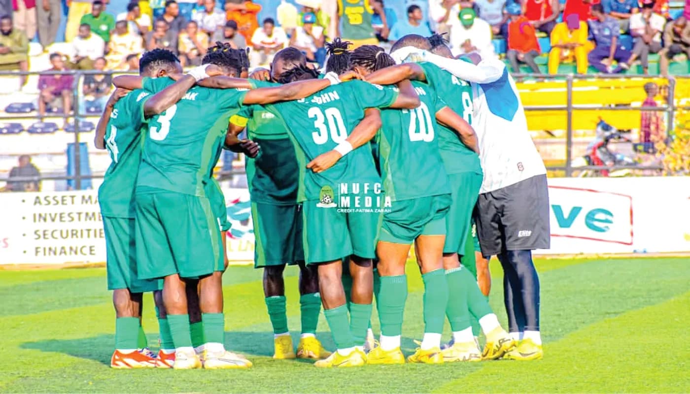 Nasarawa United players in a huddle before match