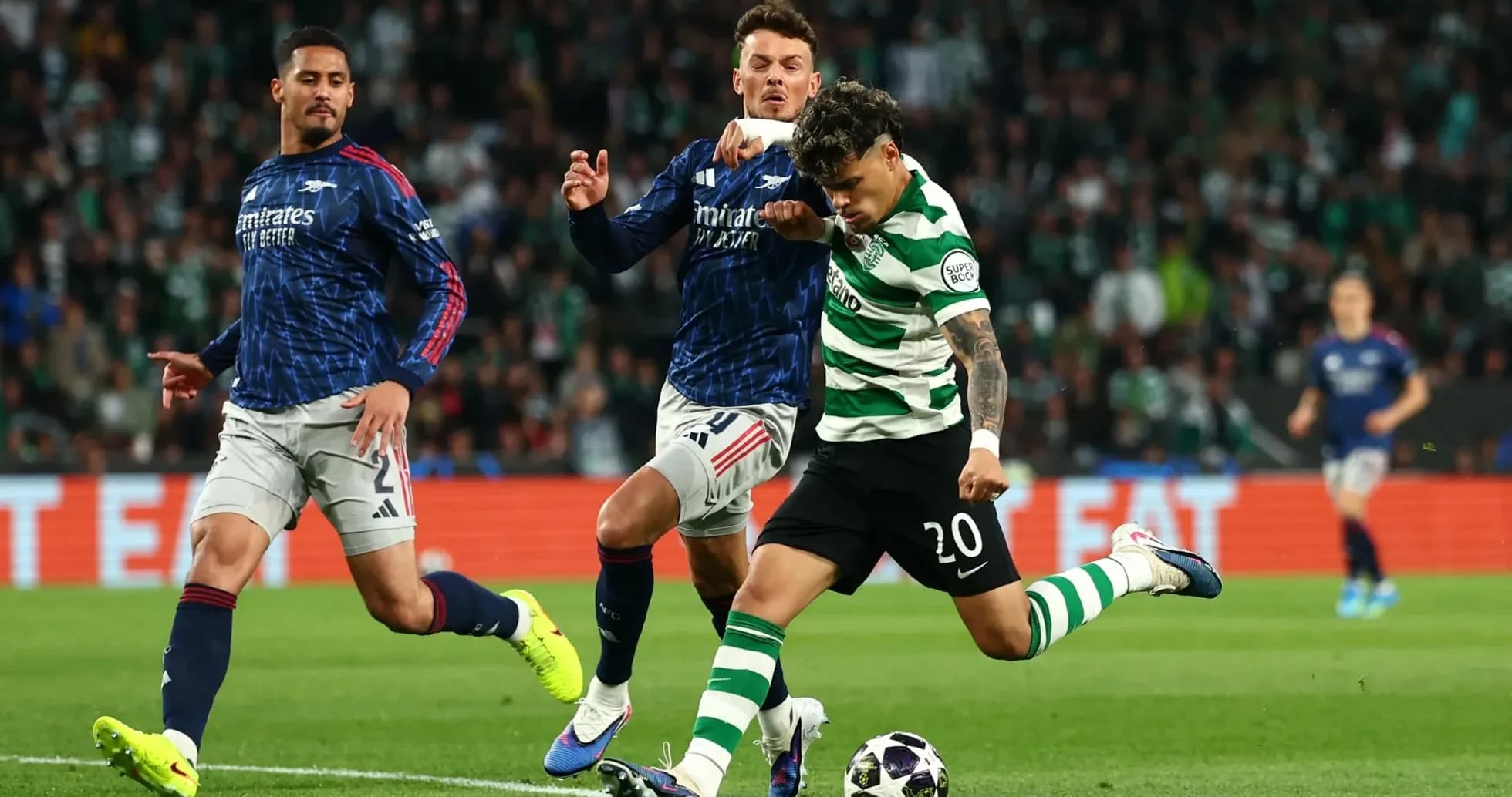 Player dribbling while being challenged by opponents