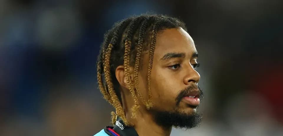 Player with braided hair in sports attire