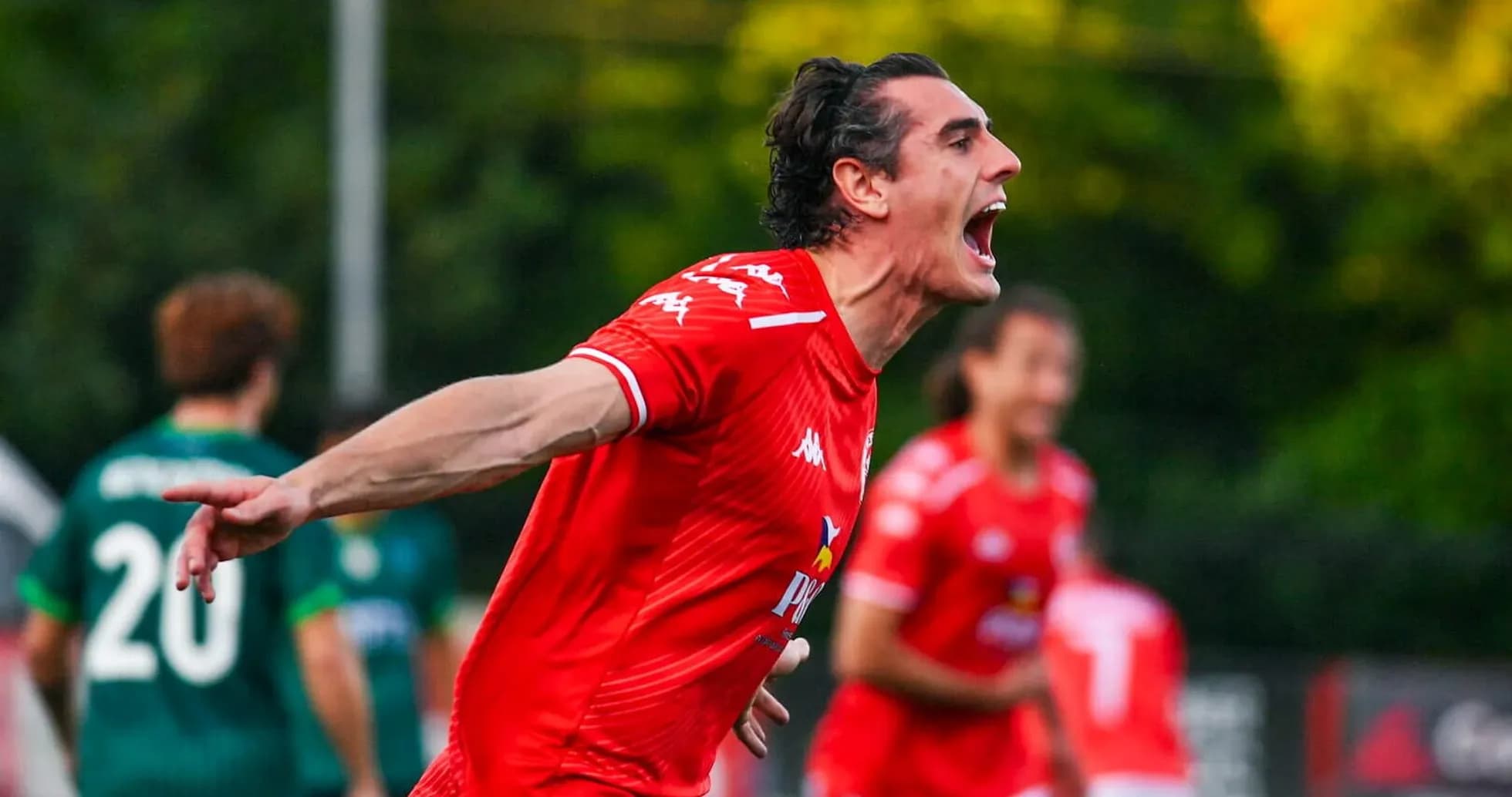 Player celebrating goal during Larne vs Saburtalo match