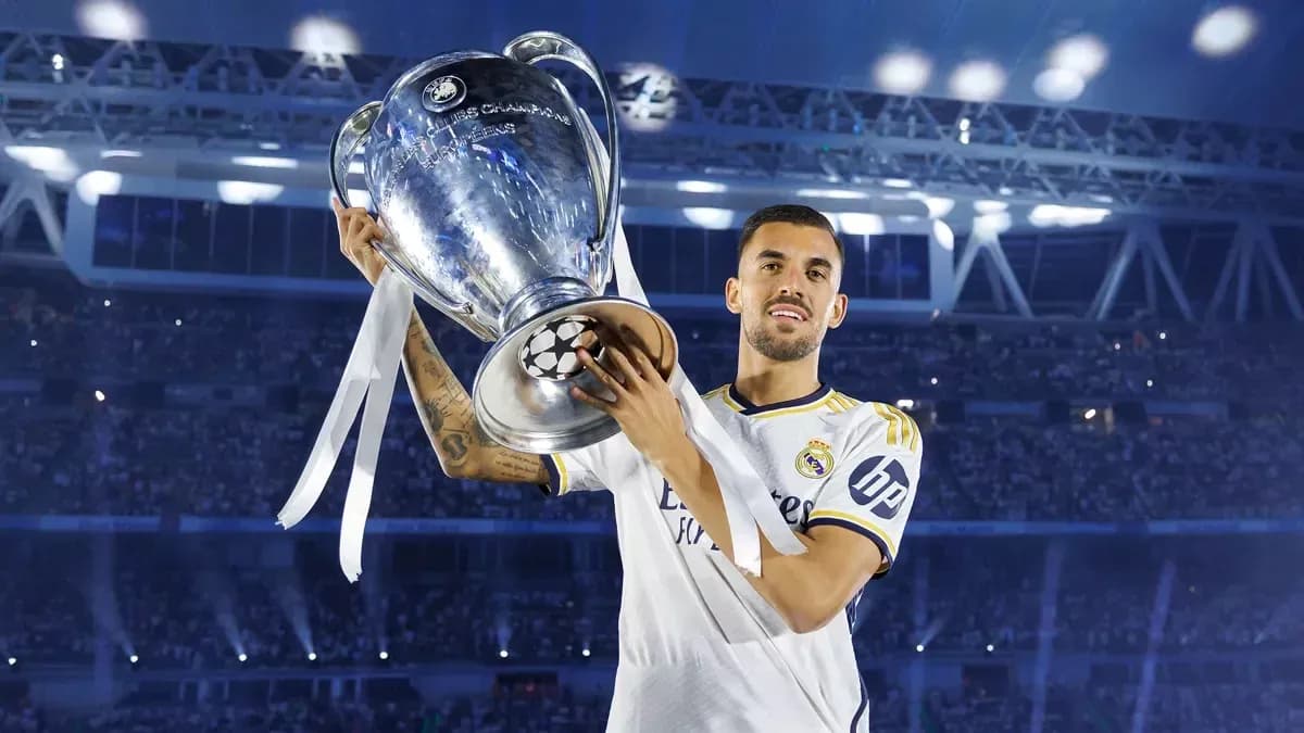 Player celebrating with UEFA Champions League trophy