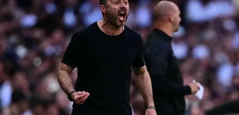 Coach shouting instructions during a match