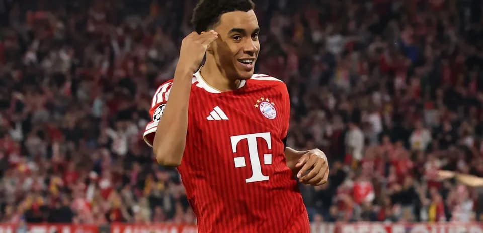 Player celebrating after scoring a goal for Bayern Munich