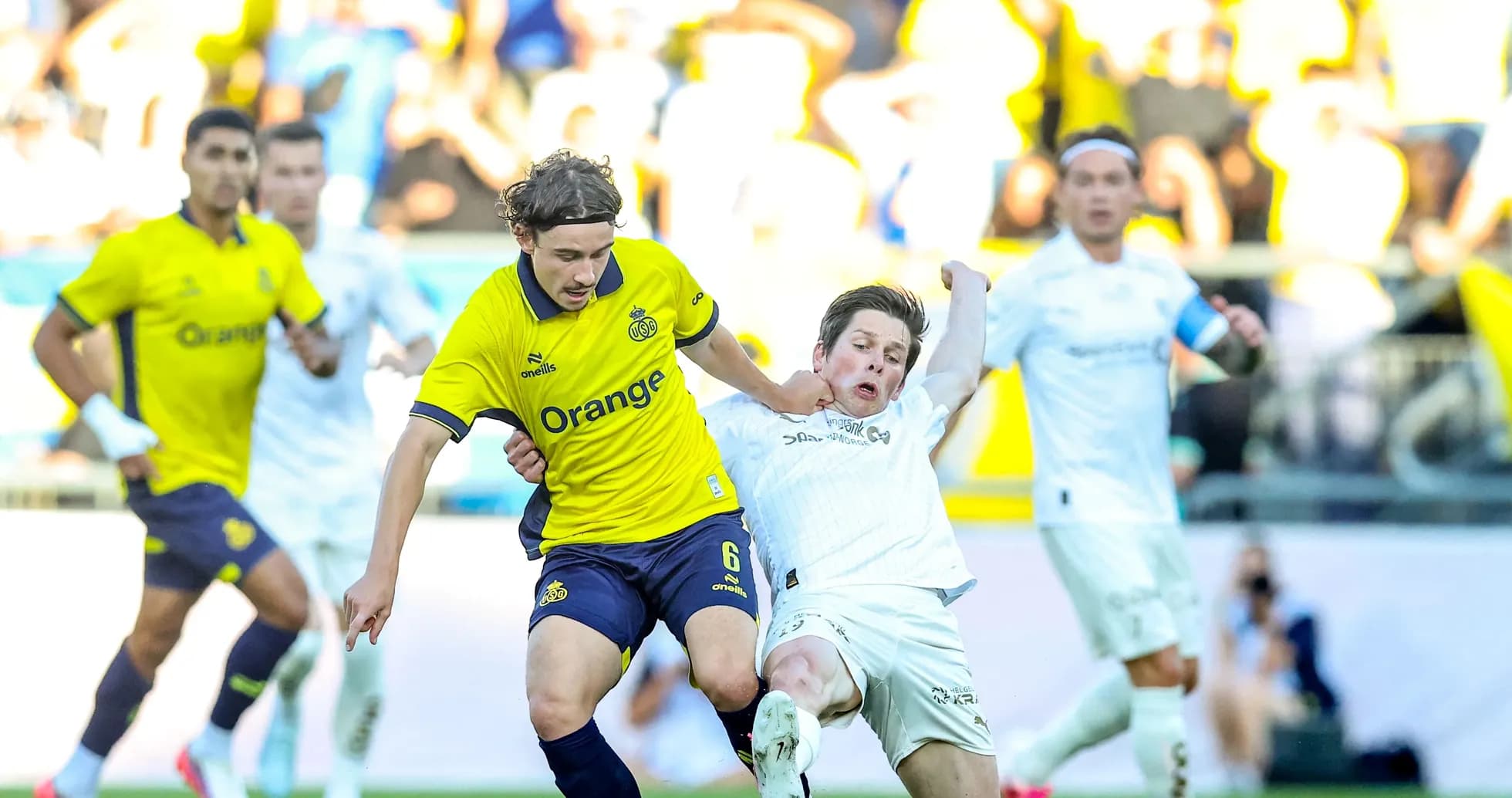 Bodo/Glimt player tackling Union St. Gilloise opponent