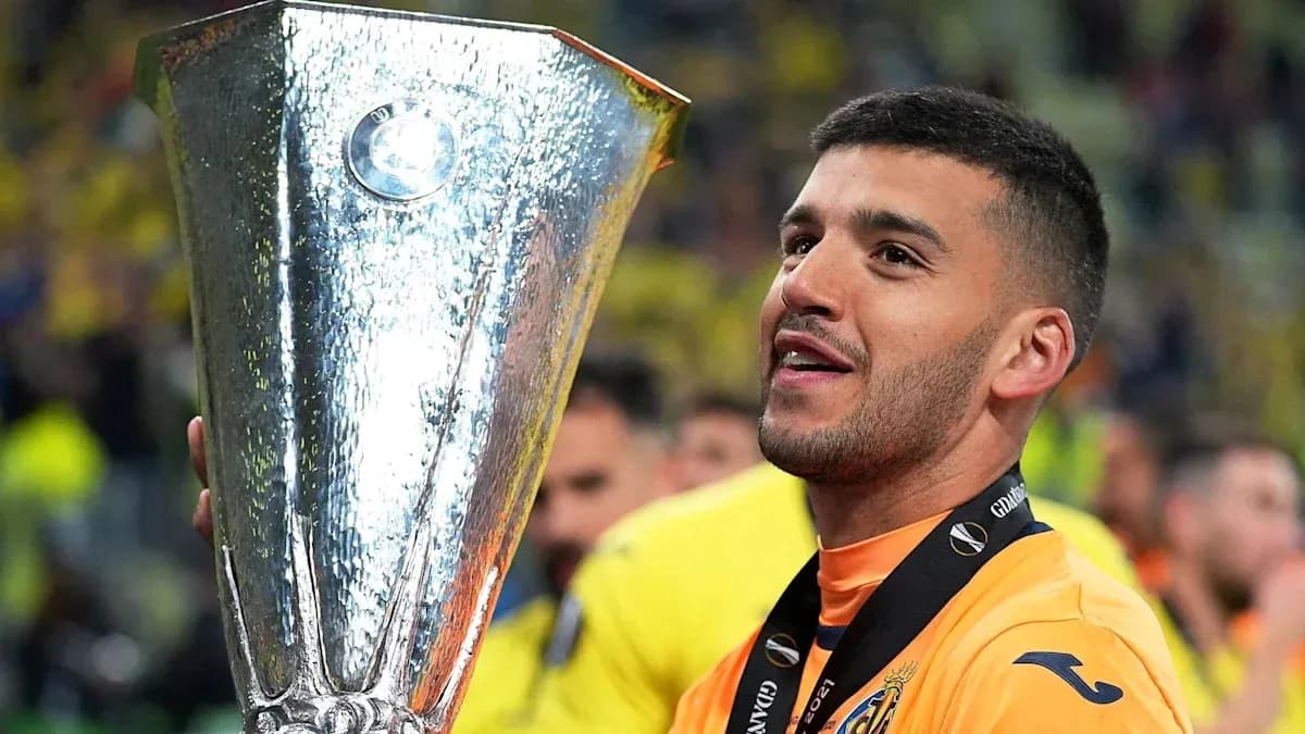 Player holding UEFA Europa League trophy after victory
