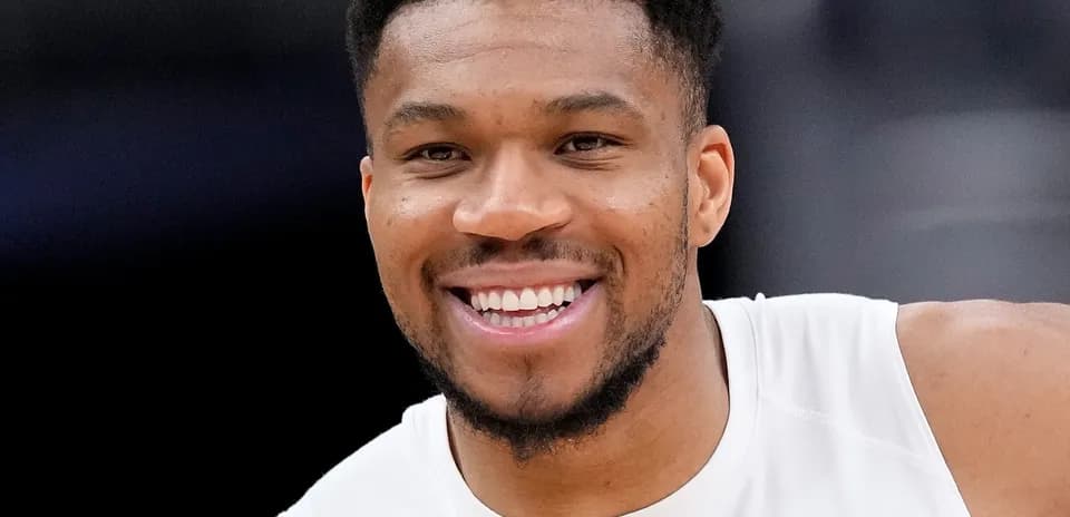 Smiling player during basketball warm-up session