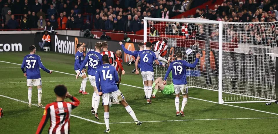 Brentford players celebrating a goal against Everton