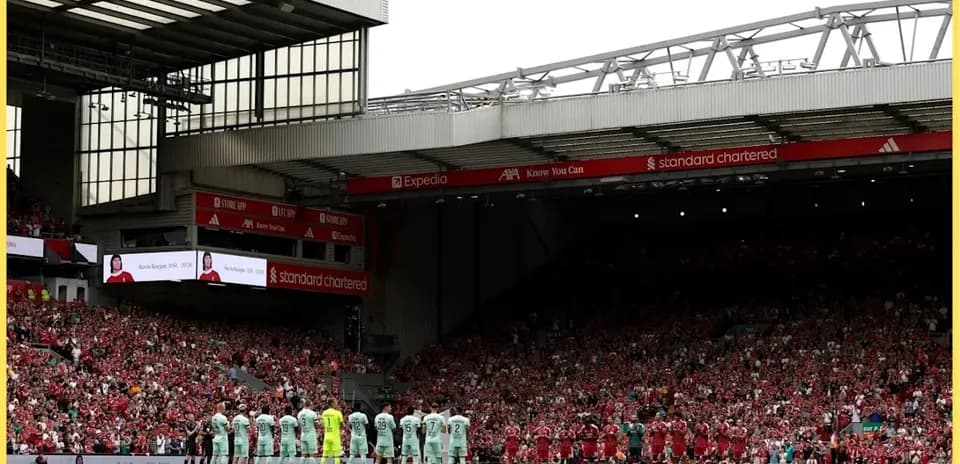 Teams lined up for a moment of silence at Anfield