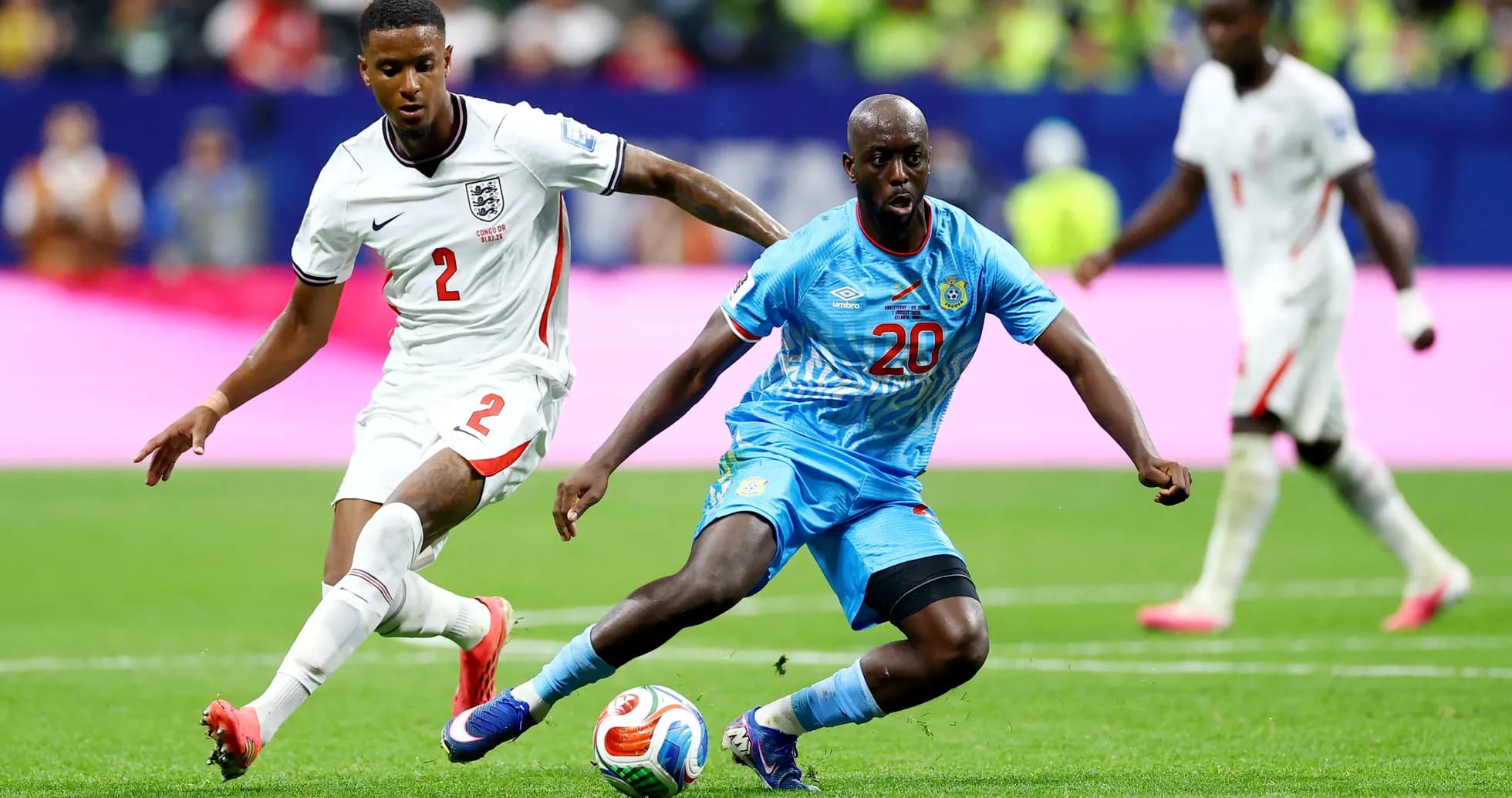 England player tackling Congo DR opponent