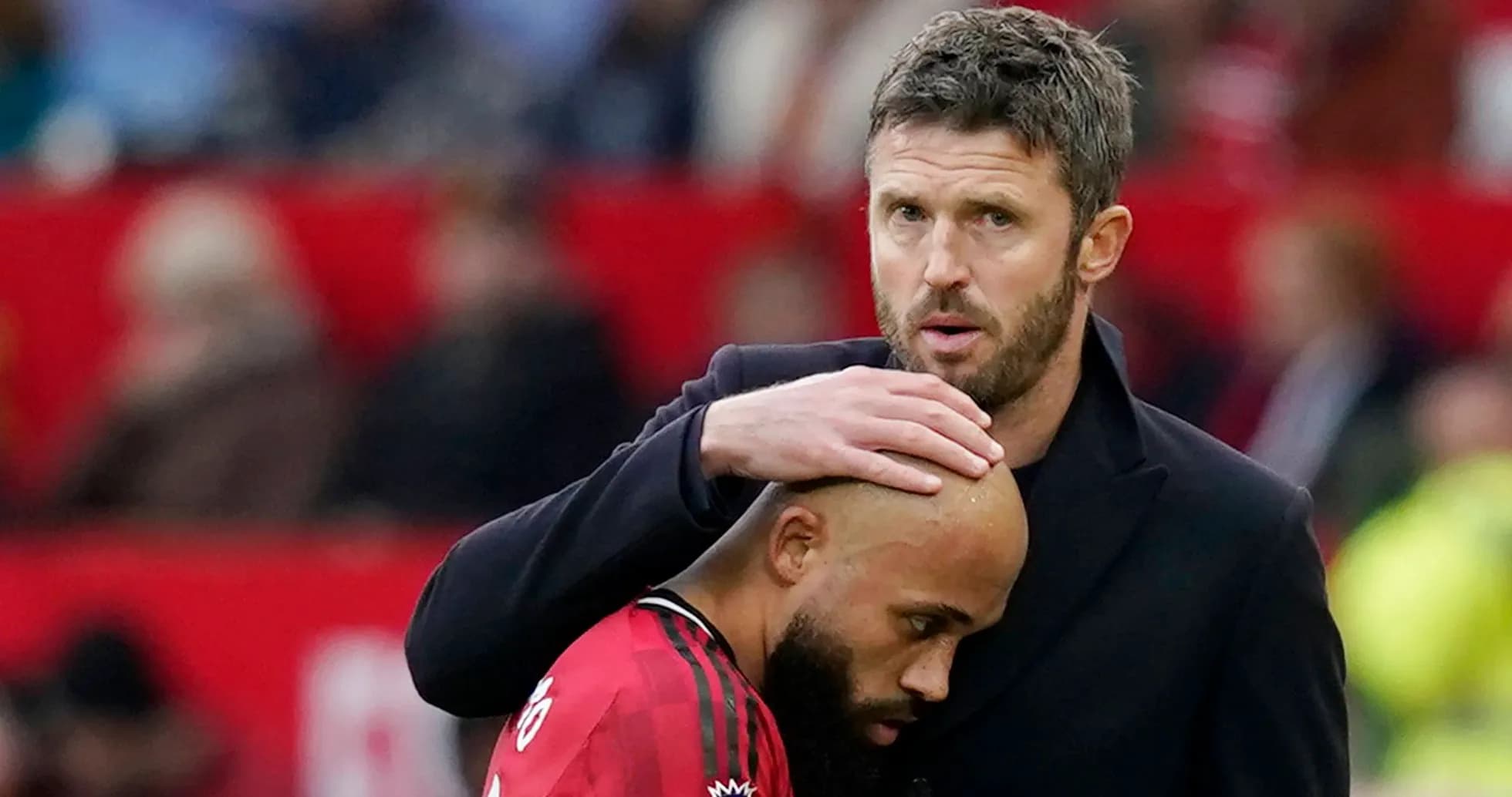 Coach comforting player during a match
