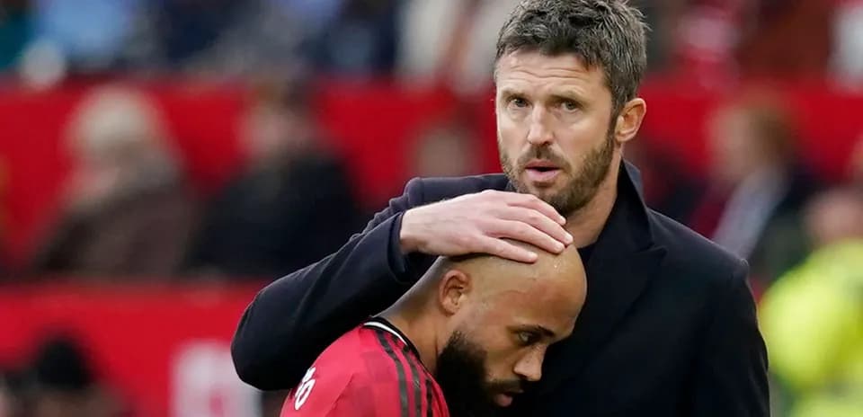 Coach comforting player during a match