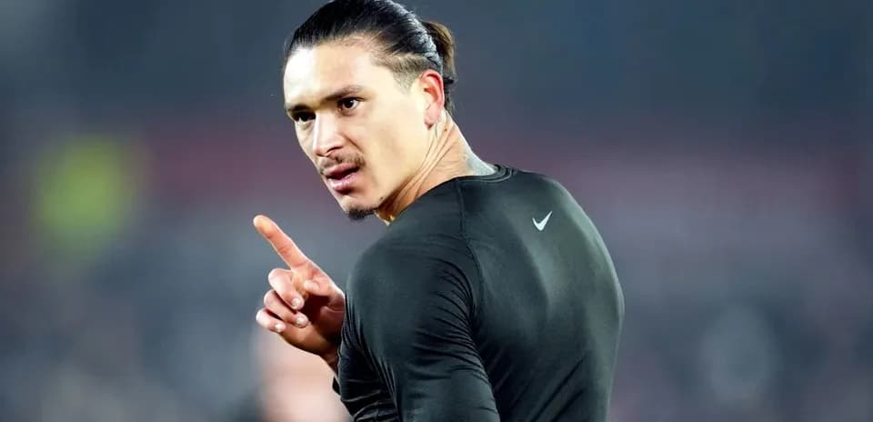 Player gesturing during a match warm-up