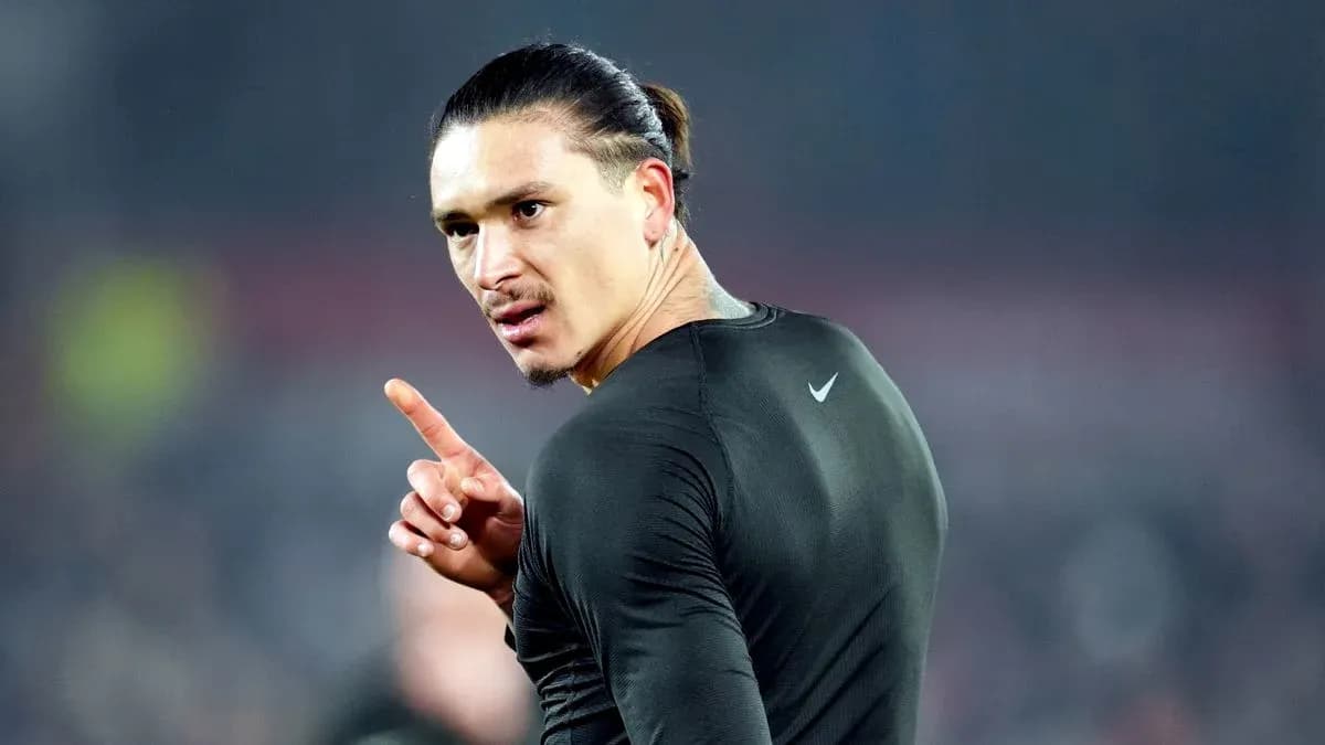 Player gesturing during a match warm-up