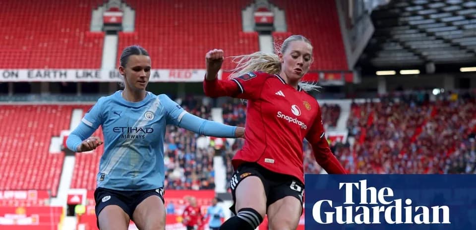 Two female players competing for the ball